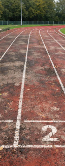 Bild einer schmutzigen Tartanbahn